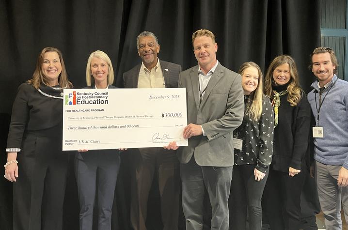 Leslie M. Sizemore, CPE; Debra Neff, UK St. Claire; CPE President Aaron Thompson; Patrick Pabian, UK; and Kayla Harrison, Elizabeth Reynolds and Casey Potter, all from UK St. Claire, accept award from CPE. Photo submitted.