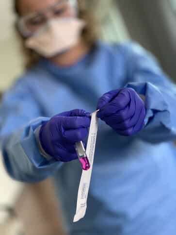 nurse with vaccine